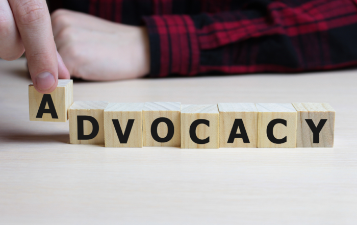 The word advocacy spelled out with block letters