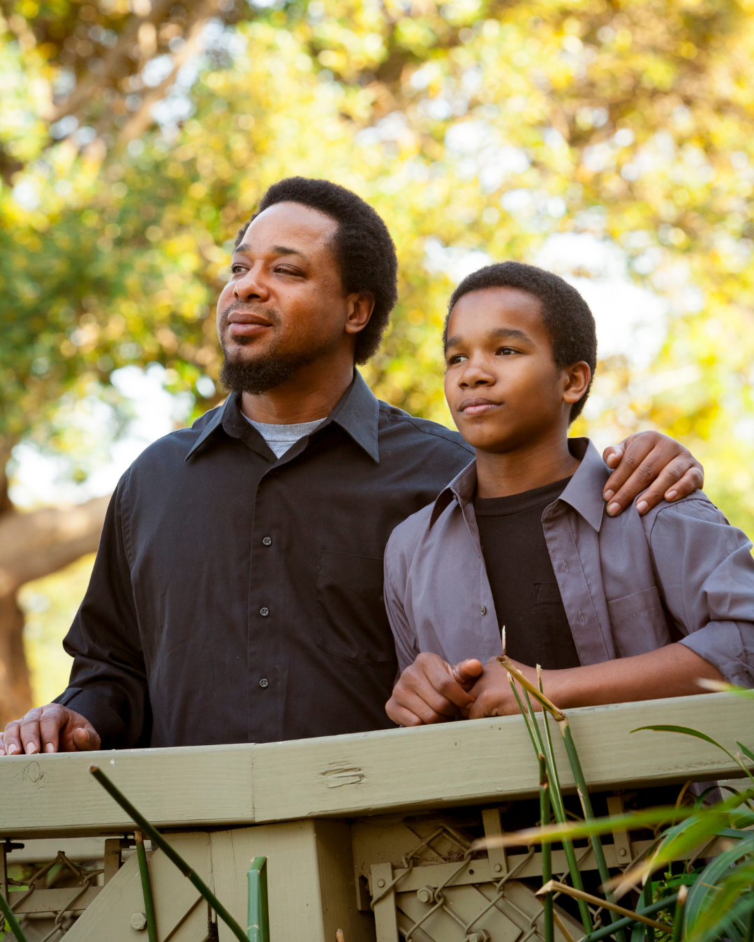 Father and son looking forward to the future