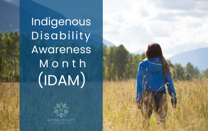 Indigenous Disability Awareness Month (IDAM) - A young Indigenous woman stands in a field looking at mountains